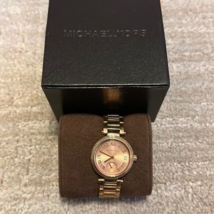 Micheal Kors watch in rose gold